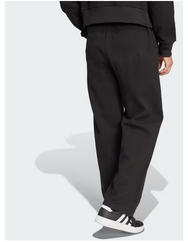 Pantalones Adidas de punto gofre con dobladillo...